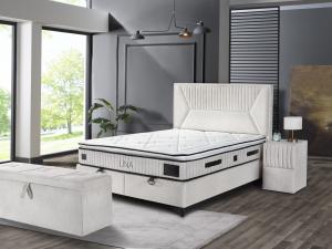 Boxspring Lina met TEDDY-stof opbergfunctie